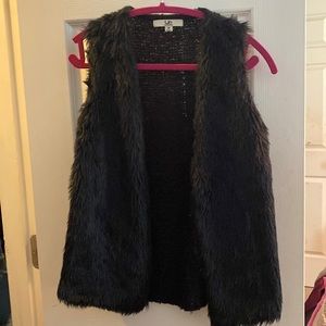 Black faux fur vest